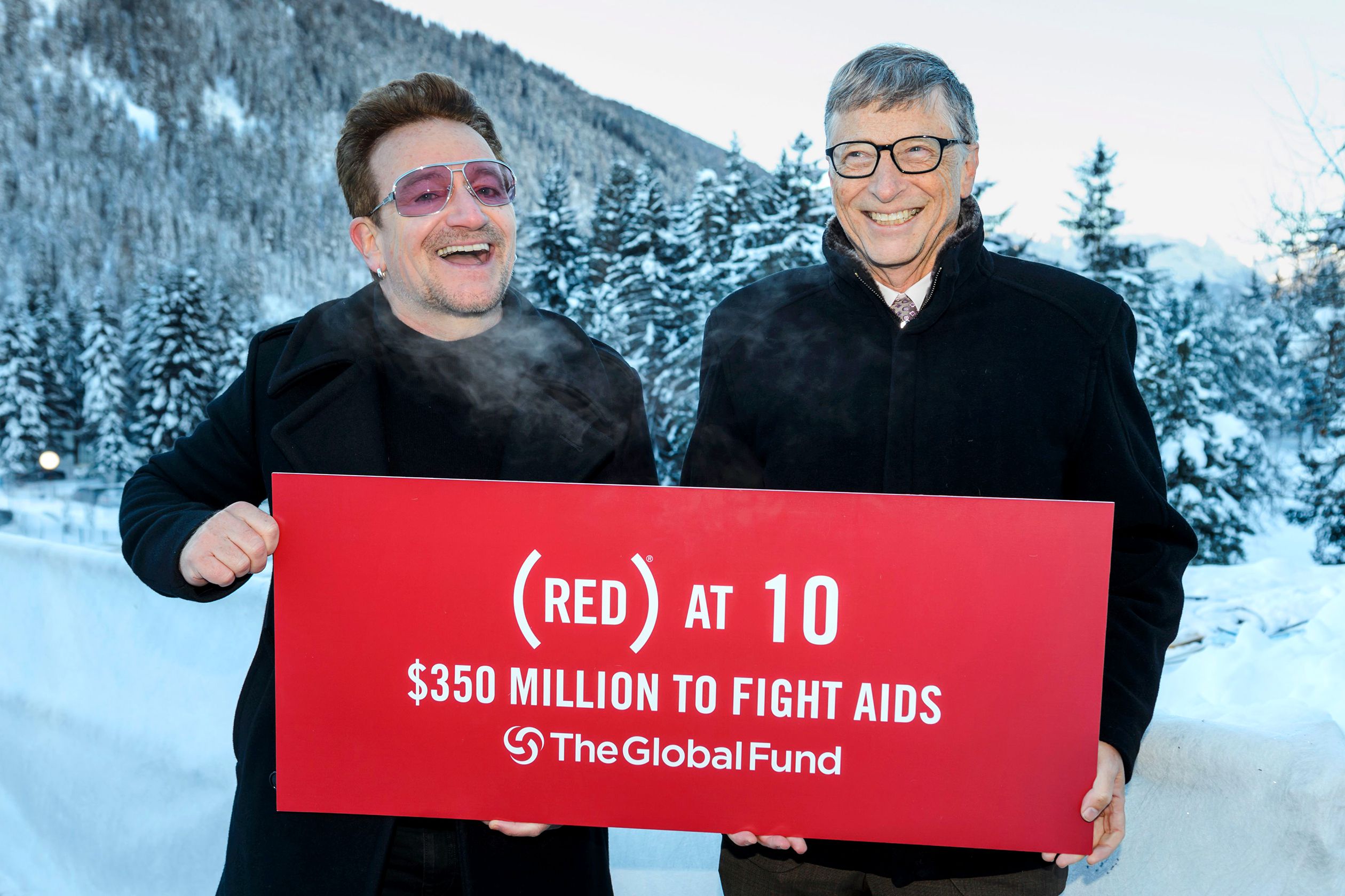 Singer Of Irish Band U2, Bono (L) Poses With Bill Gates At The World ...